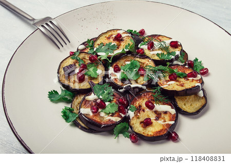 Fried eggplant, with white sauce, pomegranate seeds, top view, no people, 118408831