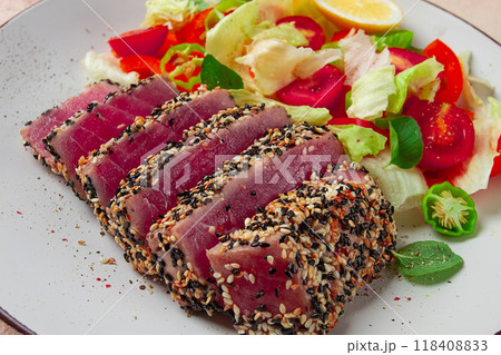 fillet of red tuna meat, fried in sesame seeds, homemade, close-up, no people, 118408833