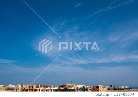 Egyptian villas and sea against blue sky, horizontal landscape Egyptian villas and sea against blue sky, horizontal landscape 118409574