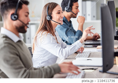 Woman, call center and working in office workspace with headset, computer and online customer support, service or help. Businesswoman, smile and contact us, crm and telemarketing employee talking Woman, call center and working in office workspace with headset, computer and online customer support, service or help. Businesswoman, smile and contact us, crm and telemarketing employee talking 118411736