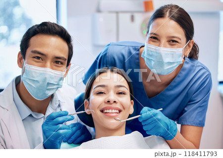 Portrait of dentist and woman in consultation for teeth whitening, service and dental care. Healthcare, dentistry and orthodontist with equipment for patient for oral hygiene, wellness and cleaning Portrait of dentist and woman in consultation for teeth whitening, service and dental care. Healthcare, dentistry and orthodontist with equipment for patient for oral hygiene, wellness and cleaning 118411793