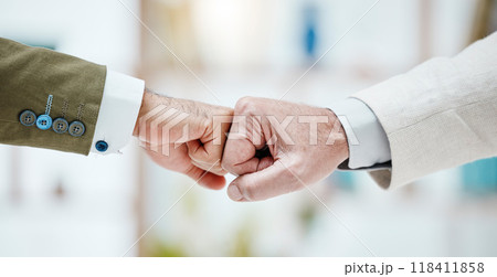 Partnership, fist bump and hands of business people together for motivation, support and cooperation. Collaboration, teamwork and men with fists for agreement, trust and management deal in office Partnership, fist bump and hands of business people together for motivation, support and cooperation. Collaboration, teamwork and men with fists for agreement, trust and management deal in office 118411858