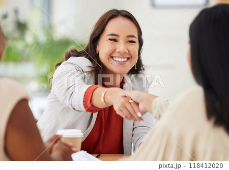 Happy, welcome and business people with a handshake in a meeting for partnership and agreement. Smile, thank you and corporate women shaking hands in an office for a contract, onboarding and greeting 118412020