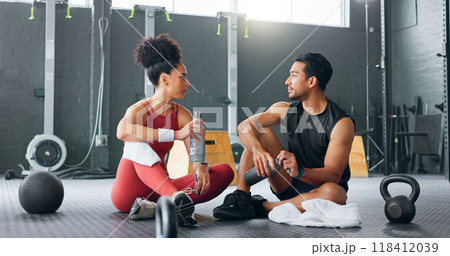 Personal trainer, man and woman at gym, break and conversation for exercise plan, water and sportswear. .Fitness instructor, training routine or athlete for mental motivation, body and healthy cardio Personal trainer, man and woman at gym, break and conversation for exercise plan, water and sportswear. .Fitness instructor, training routine or athlete for mental motivation, body and healthy cardio 118412039