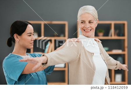 Physiotherapy, senior woman and shoulder massage of a Asian physiotherapist and rehabilitation. Physical therapy, retirement and elderly patient with happiness from arm adjustment and stretching 118412059
