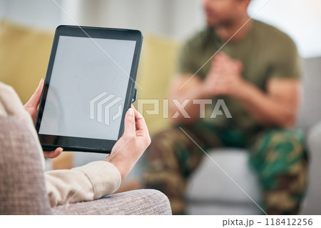 Mockup tablet, therapy and hands with a man and woman, veteran care or counseling. Support, space and a psychologist with technology while consulting with an army person in an office for help Mockup tablet, therapy and hands with a man and woman, veteran care or counseling. Support, space and a psychologist with technology while consulting with an army person in an office for help 118412256