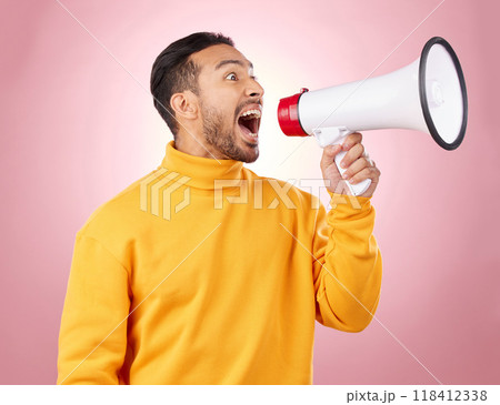Man, megaphone and voice for news, broadcast or student sale with wow announcement on studio pink background. Young person or gen z noise with call to action, university attention or college speaker 118412338