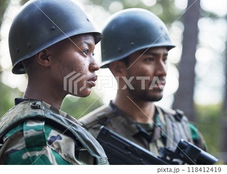 Serious people, army and ready for war, battle or fight on a mission, hero or service in nature. Man and woman soldier or team preparing security, military or conflict on the battlefield in the woods Serious people, army and ready for war, battle or fight on a mission, hero or service in nature. Man and woman soldier or team preparing security, military or conflict on the battlefield in the woods 118412419