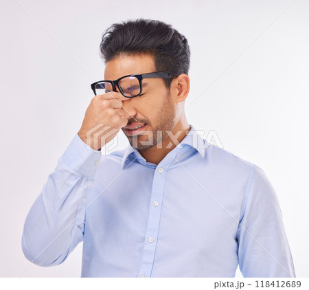 Headache, migraine and businessman stress pain, ill and sick or overworked isolated in a studio white background. Employee, sad and professional worker suffering from burnout and fatigue 118412689