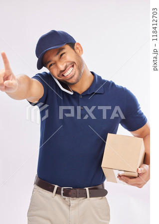Phone call, delivery smile and Asian man with box in studio isolated on a white background. Shipping, logistics and happy male courier with package and cellphone for ecommerce, talking or chatting Phone call, delivery smile and Asian man with box in studio isolated on a white background. Shipping, logistics and happy male courier with package and cellphone for ecommerce, talking or chatting 118412703
