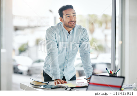 Manager, leader and happy businessman in a presentation or meeting in a boardroom planning a company strategy. Confident, sales and male employee at a startup with a vision, idea and in a office 118412911