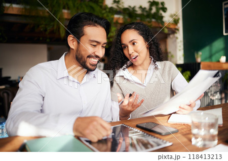 Teamwork, documents and planning with business colleagues in the office, working together on a report. Collaboration, paperwork or strategy with a man and woman employee team at work on a proposal 118413213
