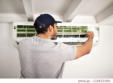 Maintenance service, air conditioner technician and man, working on ventilation filter or ac repair. Contractor, handyman or electric aircon machine expert problem solving or cleaning dust with tools Maintenance service, air conditioner technician and man, working on ventilation filter or ac repair. Contractor, handyman or electric aircon machine expert problem solving or cleaning dust with tools 118413300