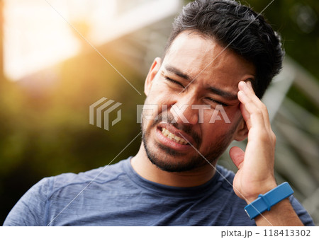 Sports, headache and man in pain outdoor for injury, vertigo and tired of health problem. Face of asian athlete, runner and training with migraine, fatigue or stress of fitness, exercise and sick 118413302