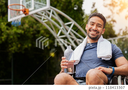 Basketball player, portrait and water for man in wheelchair on sports break, rest and drinking fitness electrolytes on court. Person with a disability, Asian athlete and bottle for exercise recovery 118413307