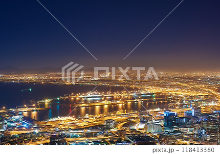 Night, city and lights with landscape, buildings and urban development with traffic, transport and streets. Evening, dark and road with network, Cape Town and highway with water, growth and travel 118413380