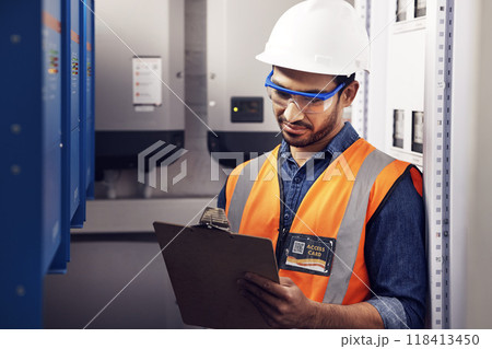 Man, electricity and technician in control room, writing notes and machine maintenance on clipboard. Male electrician, system and electrical substation for power, engineering inspection and checklist 118413450