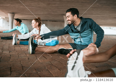 Group, workout and people stretching as a fitness club for sports, health and wellness in an urban town together. Sport, smile and happy friends training or team doing warm up exercise in a city Group, workout and people stretching as a fitness club for sports, health and wellness in an urban town together. Sport, smile and happy friends training or team doing warm up exercise in a city 118413610