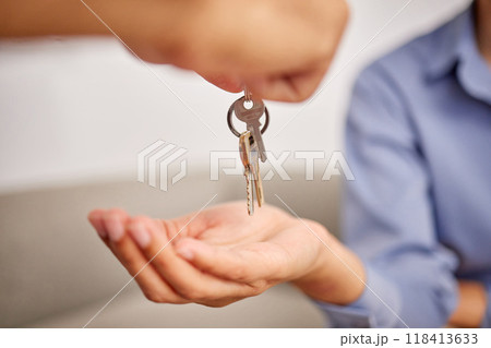 Hands, real estate and giving keys to customer after moving into new home. Property agent, realtor and handing over key to owner for sale, loan or mortgage investment in apartment, house or rent. 118413633