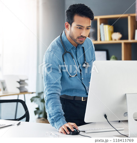 Serious, man doctor and computer research, healthcare innovation and planning online. Medical worker, desktop technology and reading data of test results, wellness management and telehealth database 118413769