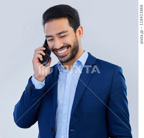 Smile, phone call and asian businessman in studio, talking and networking on white background. Smartphone, conversation and man in suit, communication and technology for investor trading at startup. 118413868