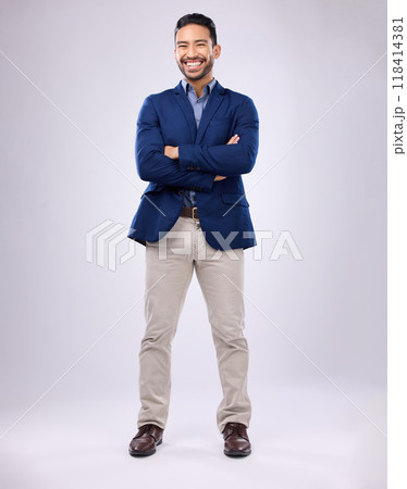 Crossed arms, smile and portrait of man in studio with positive mindset, happy and confidence. Corporate, business and isolated male standing as professional with pride on white background mockup 118414381
