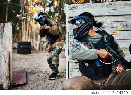 Sports, paintball and woman with gun for battle, game or competition outdoors on field. War fight, military army and female soldier with weapon on shooting range while hiding from player for exercise 118414390