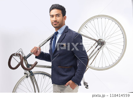 Business man, bicycle and studio portrait with retro suit, sustainable transport or pride by white background. Young entrepreneur, vintage fashion and bike for travel, transportation and eco friendly 118414559