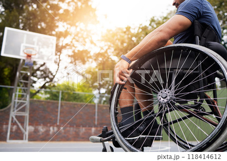 Sports, basketball court and man in wheelchair for goal in competition, challenge and practice outdoors. Fitness, wellness and male person with disability with ball for training, workout and exercise 118414612