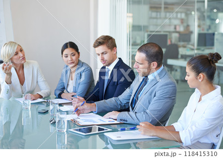 Boardroom, business people and meeting with executive team or management for b2b negotiation or planning. Men and woman at office table with finance paperwork talking about an opinion or solution 118415310