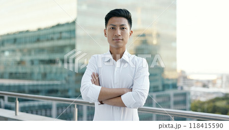 Portrait, arms crossed and Asian man on office building balcony with confidence, pride and business entrepreneur. City, terrace and proud businessman with urban job at consulting startup on cityscape 118415590