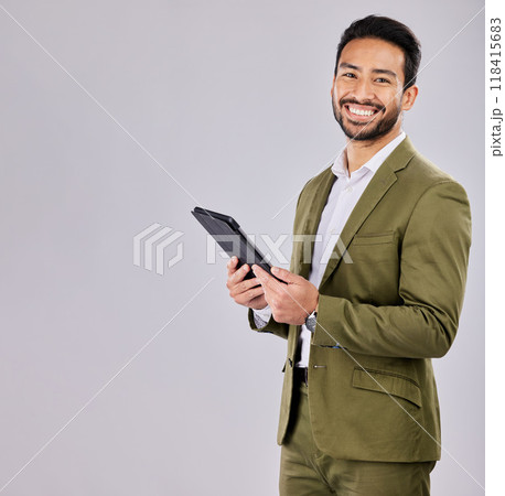 Portrait, tablet and mockup with a business man in studio on a gray background for research or marketing. Internet, search and advertising with a male employee standing on blank mock up space 118415683
