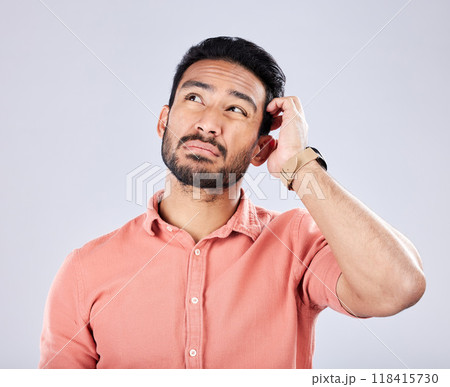 Confused, thinking and Asian man with gesture for an idea isolated on a grey studio background. Doubt, frustrated and Japanese person with memory loss, confusion and contemplation on a backdrop 118415730