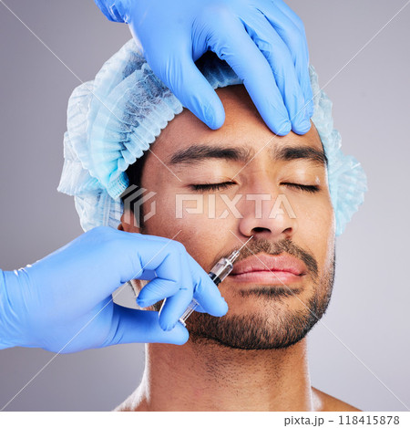 Hands, facelift and plastic surgery with a man in studio on a gray background for a botox injection. Face, change and transformation with a male customer in a clinic for beauty or antiaging filler 118415878