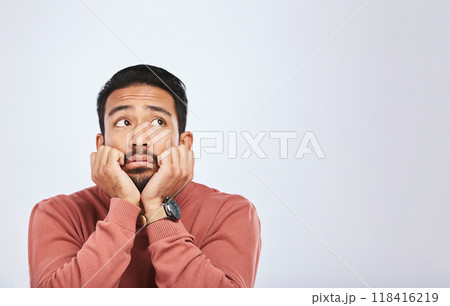Depression, thinking and sad asian man in studio for stress or broken heart, lonely or bored on grey background. Doubt, fear and face of male with anxiety, grief or trauma and mental health crisis 118416219