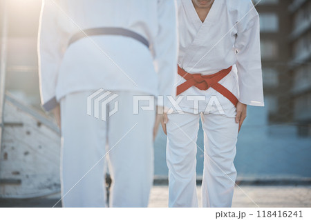Karate, bow and men outdoor for training, workout and start exercise in city. Martial arts, sports and people in competition for taekwondo, battle and challenge to fight for healthy body in fitness 118416241