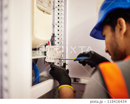 Electrician, screwdriver and repair with man in control room for tools, mechanic and safety. Electricity, energy and power with male technician and check for generator, maintenance and circuit Electrician, screwdriver and repair with man in control room for tools, mechanic and safety. Electricity, energy and power with male technician and check for generator, maintenance and circuit 118416434