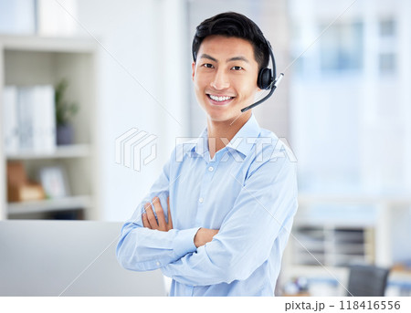 Call center, portrait and man with arms crossed for telemarketing, customer service and support. Face, contact us and confident sales agent, happy Asian consultant and crm professional from Japan. Call center, portrait and man with arms crossed for telemarketing, customer service and support. Face, contact us and confident sales agent, happy Asian consultant and crm professional from Japan. 118416556