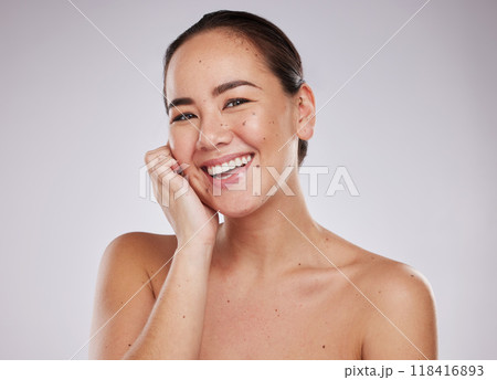 Asian woman, beauty and face portrait with smile in studio for skincare, dermatology and cosmetics. Happy aesthetic model person with makeup, mole and facial self care for wellness on grey background Asian woman, beauty and face portrait with smile in studio for skincare, dermatology and cosmetics. Happy aesthetic model person with makeup, mole and facial self care for wellness on grey background 118416893