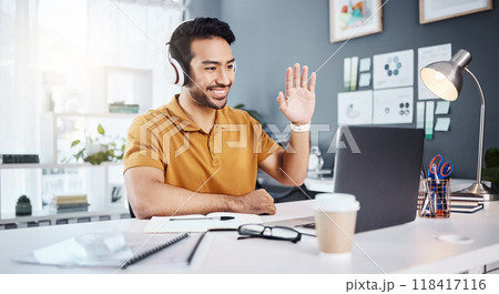 Man, headphones and laptop, video conference with smile and wave hello, remote work with webinar. Communication, working from home and virtual meeting seminar, happy male freelancer and internet Man, headphones and laptop, video conference with smile and wave hello, remote work with webinar. Communication, working from home and virtual meeting seminar, happy male freelancer and internet 118417116