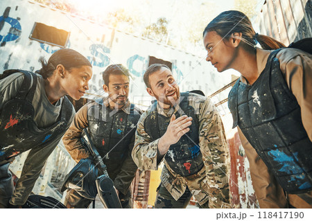 Paintball game, group strategy and team discussion, conversation or battlefield meeting about military mission. Teamwork communication, huddle and people talking about war planning, battle or tactics 118417190