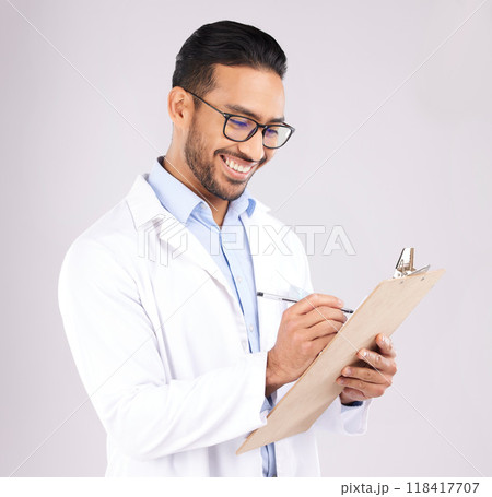Happy man, doctor and writing on clipboard in studio, planning documents and healthcare schedule. Asian medical worker with report of insurance checklist, medicine notes or script on white background Happy man, doctor and writing on clipboard in studio, planning documents and healthcare schedule. Asian medical worker with report of insurance checklist, medicine notes or script on white background 118417707
