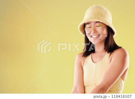 Mockup, happy and woman with eyes on her face isolated on a yellow background in a studio. Carefree, smile and Asian model with a playful, funny and comic product for facial expression with space Mockup, happy and woman with eyes on her face isolated on a yellow background in a studio. Carefree, smile and Asian model with a playful, funny and comic product for facial expression with space 118418107