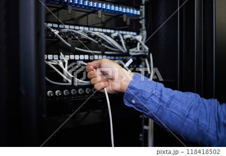Engineer hands, server room and cable connection for software update or maintenance at night. Cybersecurity wires, cloud computing and male programmer or man check database network in data center. Engineer hands, server room and cable connection for software update or maintenance at night. Cybersecurity wires, cloud computing and male programmer or man check database network in data center. 118418502