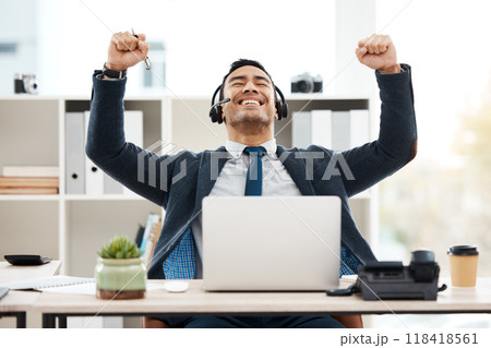 Business man, success and call center with celebration and work promotion email. Male worker, win and good news on a laptop in a office with motivation and typing at telemarketing job with smile 118418561