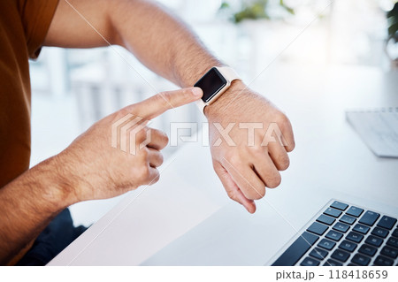 Time check, work and hands of a man with a watch for a notification, reading information or email. Business, busy and arm of a businessman checking a digital clock while working on a laptop in office Time check, work and hands of a man with a watch for a notification, reading information or email. Business, busy and arm of a businessman checking a digital clock while working on a laptop in office 118418659