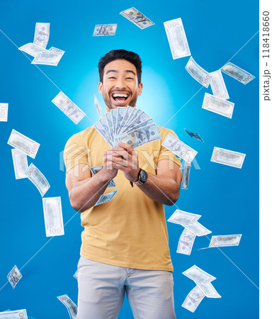 Happy, portrait of a man with money fan and in a blue background for investment. Rich or cash, stock market or budget and male person with financial freedom against a studio backdrop for winner prize Happy, portrait of a man with money fan and in a blue background for investment. Rich or cash, stock market or budget and male person with financial freedom against a studio backdrop for winner prize 118418660