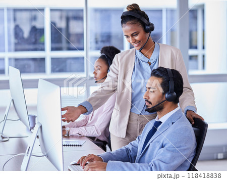 Business people, call center and mentor coaching consultant in telemarketing, sales or advice at the office. Female leader agent helping employee in contact us for customer support or service at desk 118418838