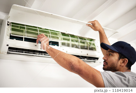 Maintenance, air conditioner technician and man with filter, working on ventilation or ac repair. Contractor, handyman or electric aircon machine expert problem solving or cleaning dust in office Maintenance, air conditioner technician and man with filter, working on ventilation or ac repair. Contractor, handyman or electric aircon machine expert problem solving or cleaning dust in office 118419014