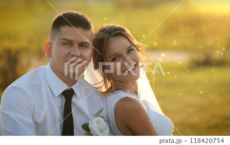 Portrait of a happy bride and groom  118420754